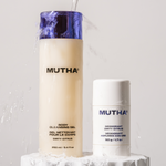 Stylish image of the Body Cleansing Gel and Deodorant standing on a surface while water pours down on them