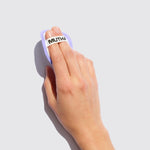 Image of a hand holding a Reusable Cotton Round strapped to two fingers
