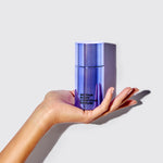 Image of a hand holding the Body Contour Serum