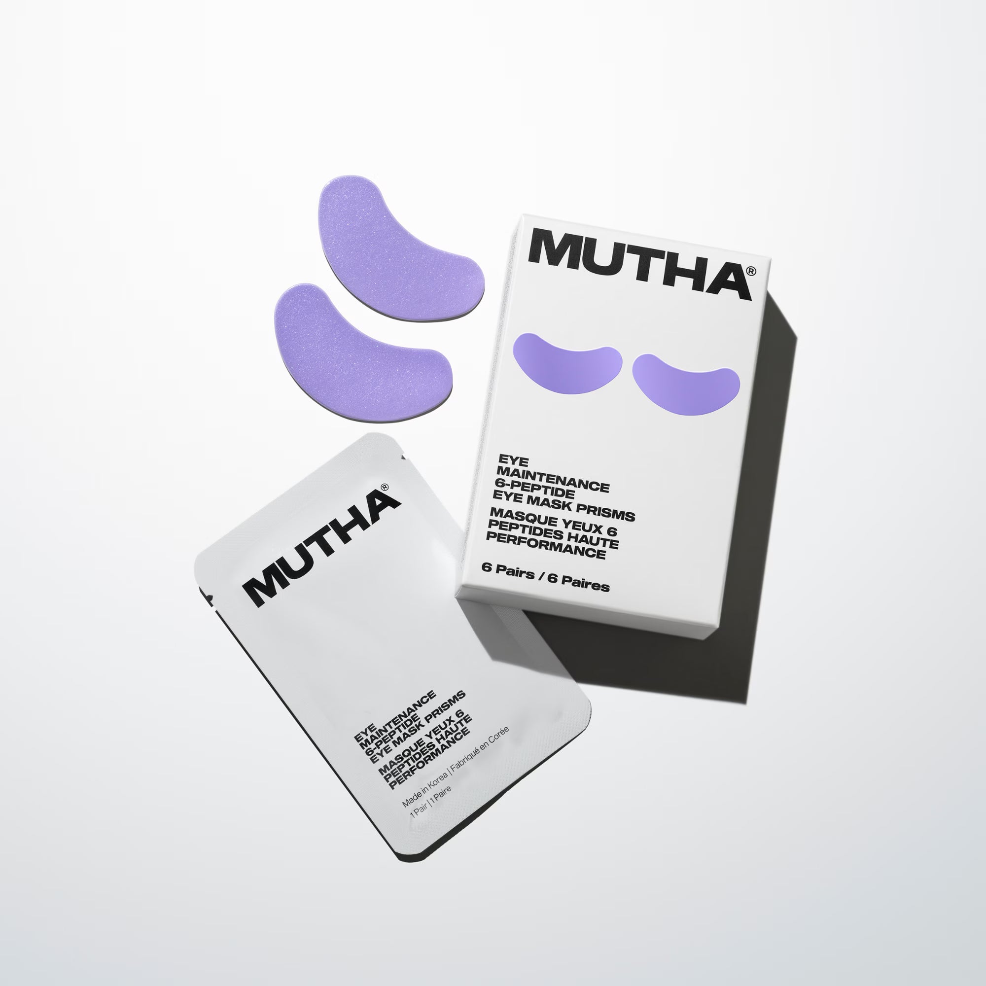 MUTHA eye mask packaging with purple eye patches on a white background
